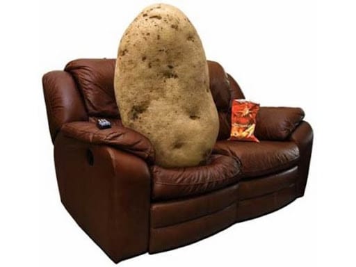 A potato laying on..a couch